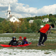 A family of accidental snow bunnies trade in their swim trunks for sleds in Burlington, VT.